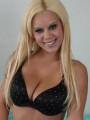 Jennys huge tits are falling out of her black bra