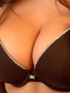 Brookes huge tits are popping out of her bra
