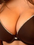 Brookes huge tits are popping out of her bra