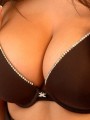 Brookes huge tits are popping out of her bra