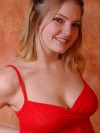 Danielle looks super cute and innocent in her red babydoll and black tight panties
