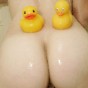Emma has a shower with lots of bubbles and her rubber ducks