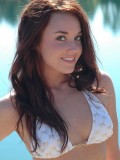Heidi gets topless on the beach at the lake