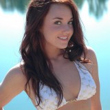 Heidi gets topless on the beach at the lake