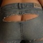 Kori in ripped jeans