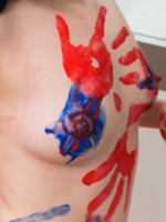 Ravon covers her tight teen body with finger paint and then rinses off