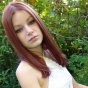 Kori outside in white