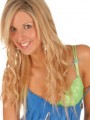 Watch a horny teen pull off her tiny dress showing off her cute bra and panties