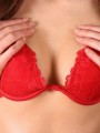 Watch as Ruby pushes her perky perfect tits together in a sexy red bra