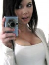 Super cute teen takes selfshot pictures of herself in the mirror